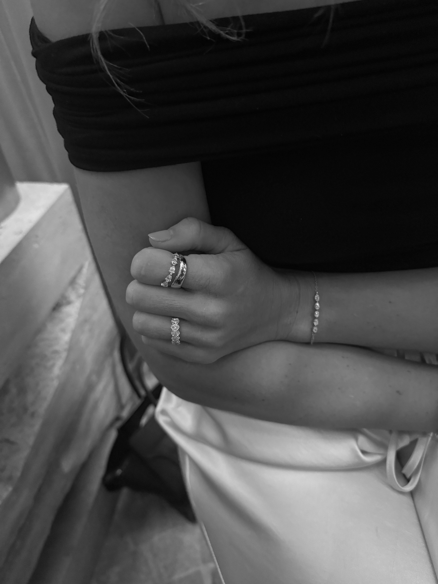 FREDI pear shaped diamond ring worn on hand in solid white gold by DÉSIR, an Australian fine jewellery brand