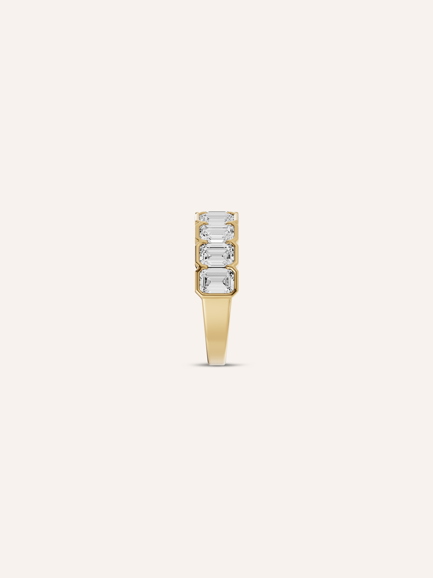 ZARA emerald-cut diamond eternity ring worn on hand as a diamond wedding band in solid yellow gold, made in Australia by DÉSIR