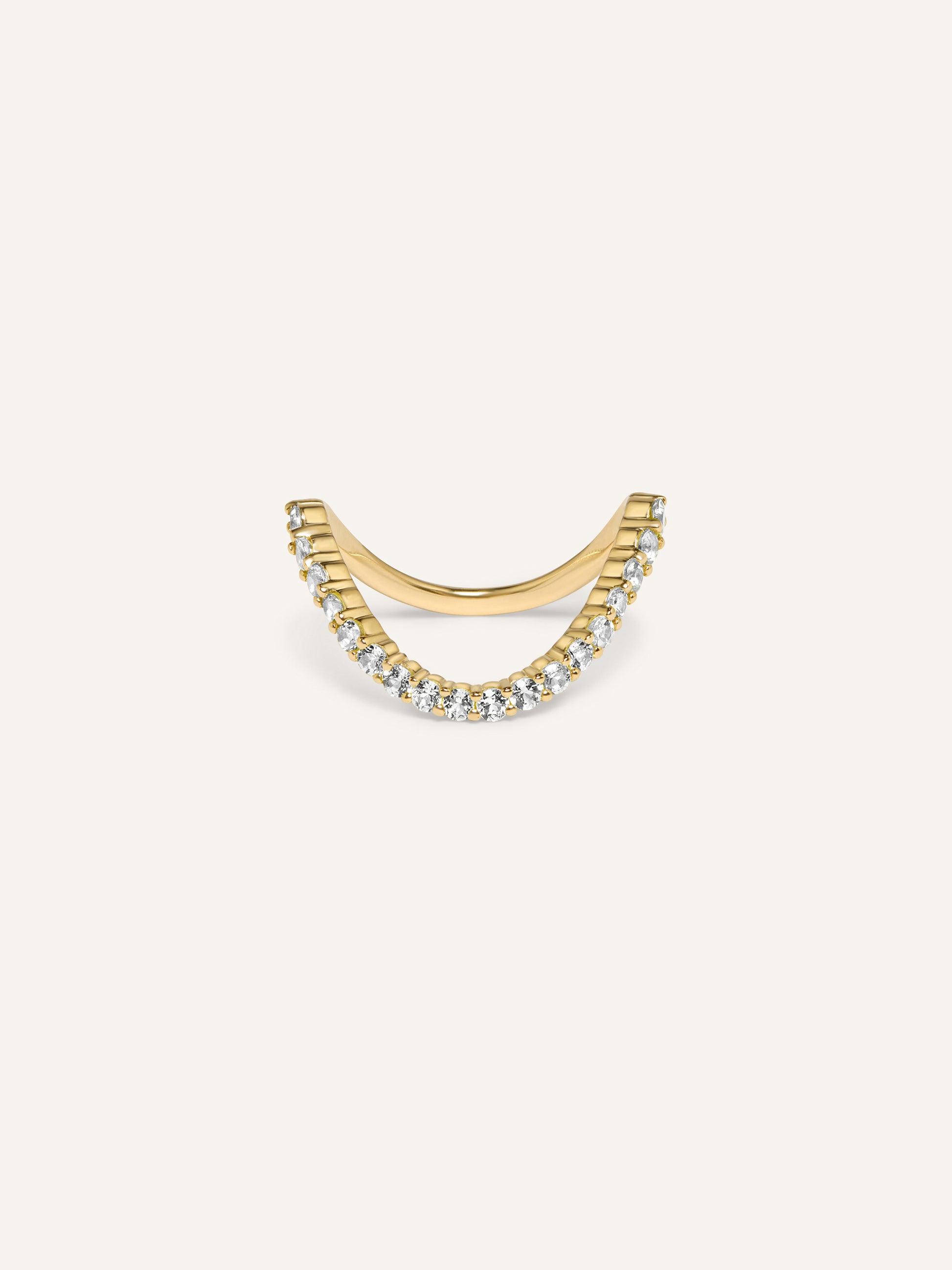 A contoured gold band ring with lab grown diamonds, designed for layering and minimalist appeal.