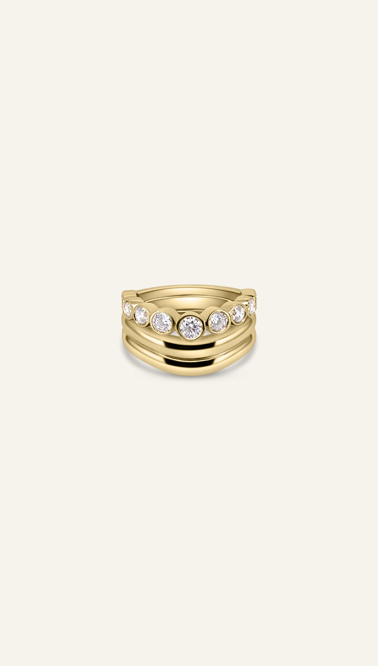 AVA ring stacked beneath the SCULPT ring in solid yellow gold, the start of the diamond ring stack by DÉSIR