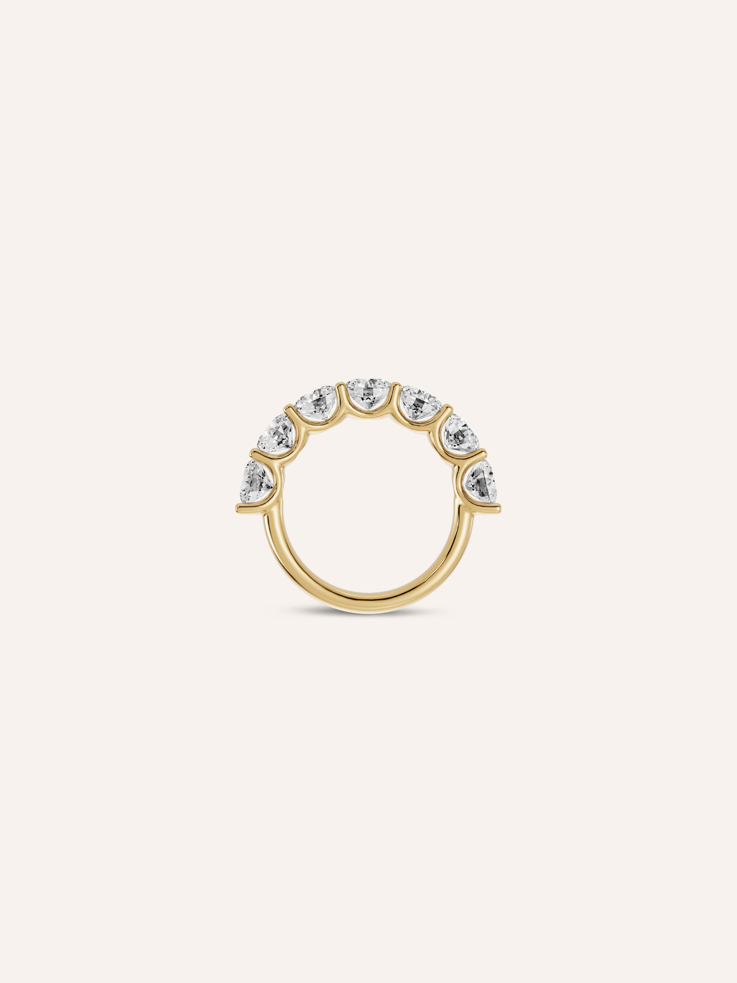 Side view of the BONNI ring, seven round lab-grown diamonds scallop-set across a half-eternity band in 18ct yellow gold