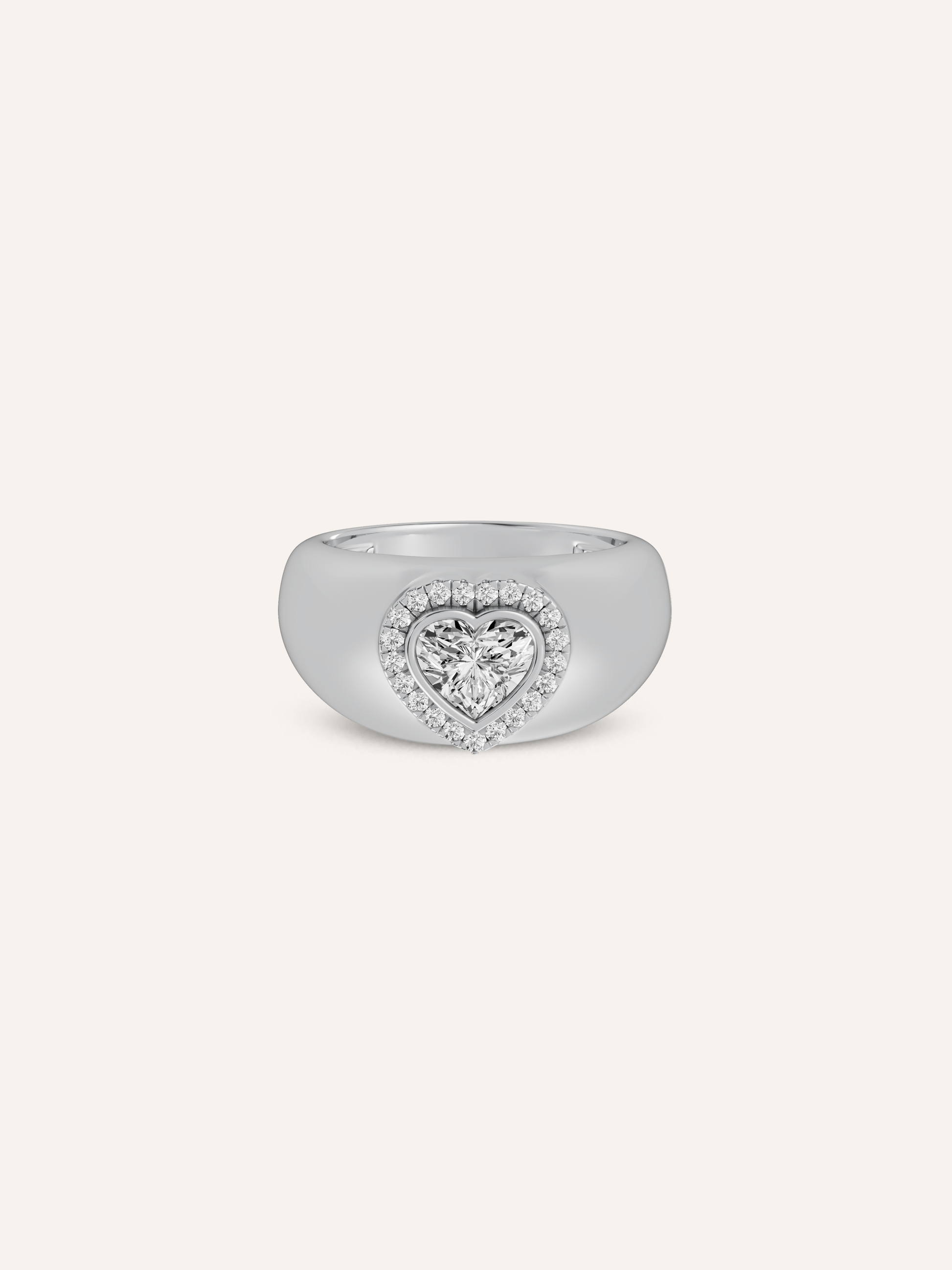 A white gold heart signet ring in white background