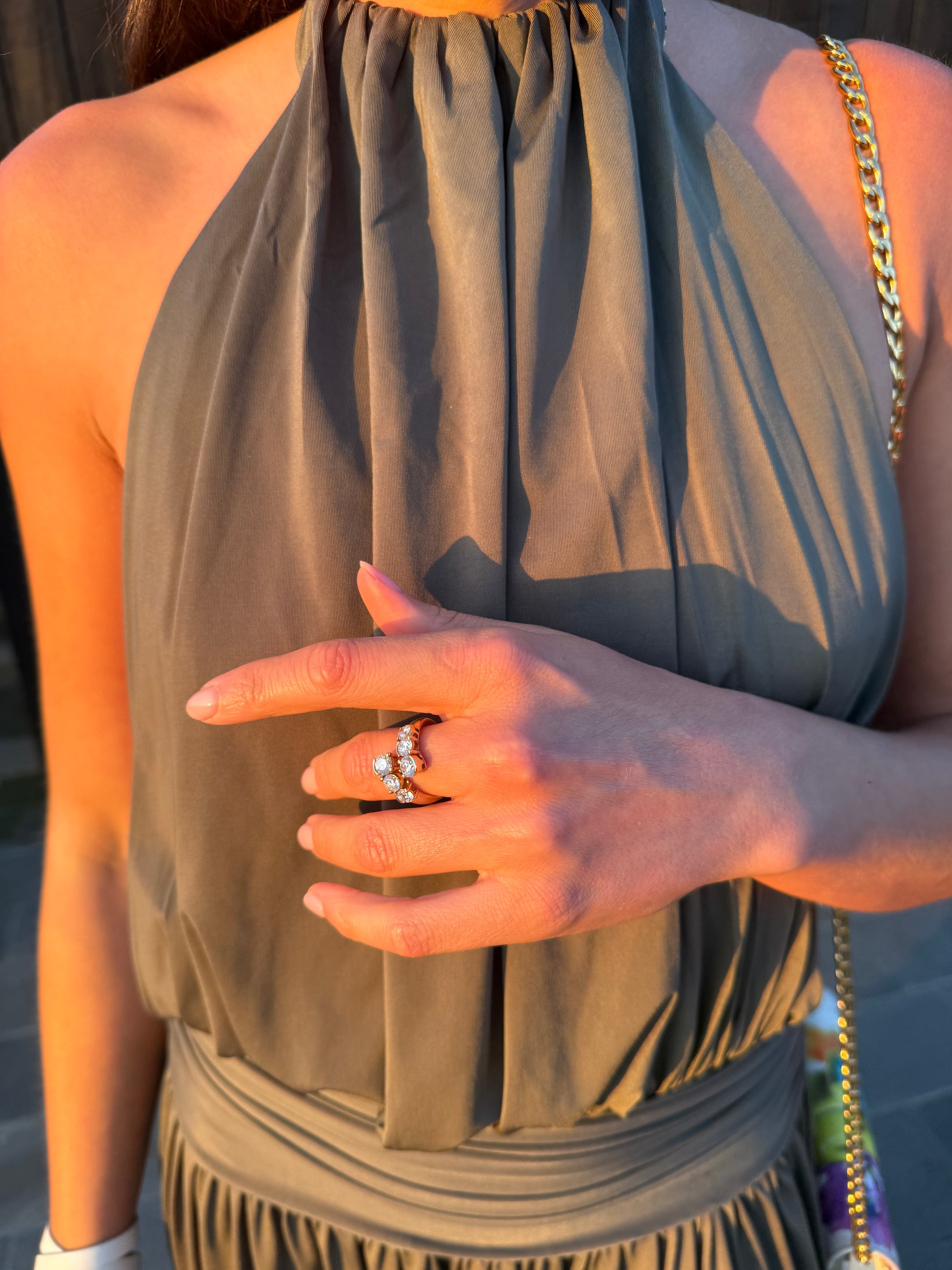 ELA round diamond wrap ring worn on hand as a modern engagement ring in solid yellow gold, made in Australia by DÉSIR