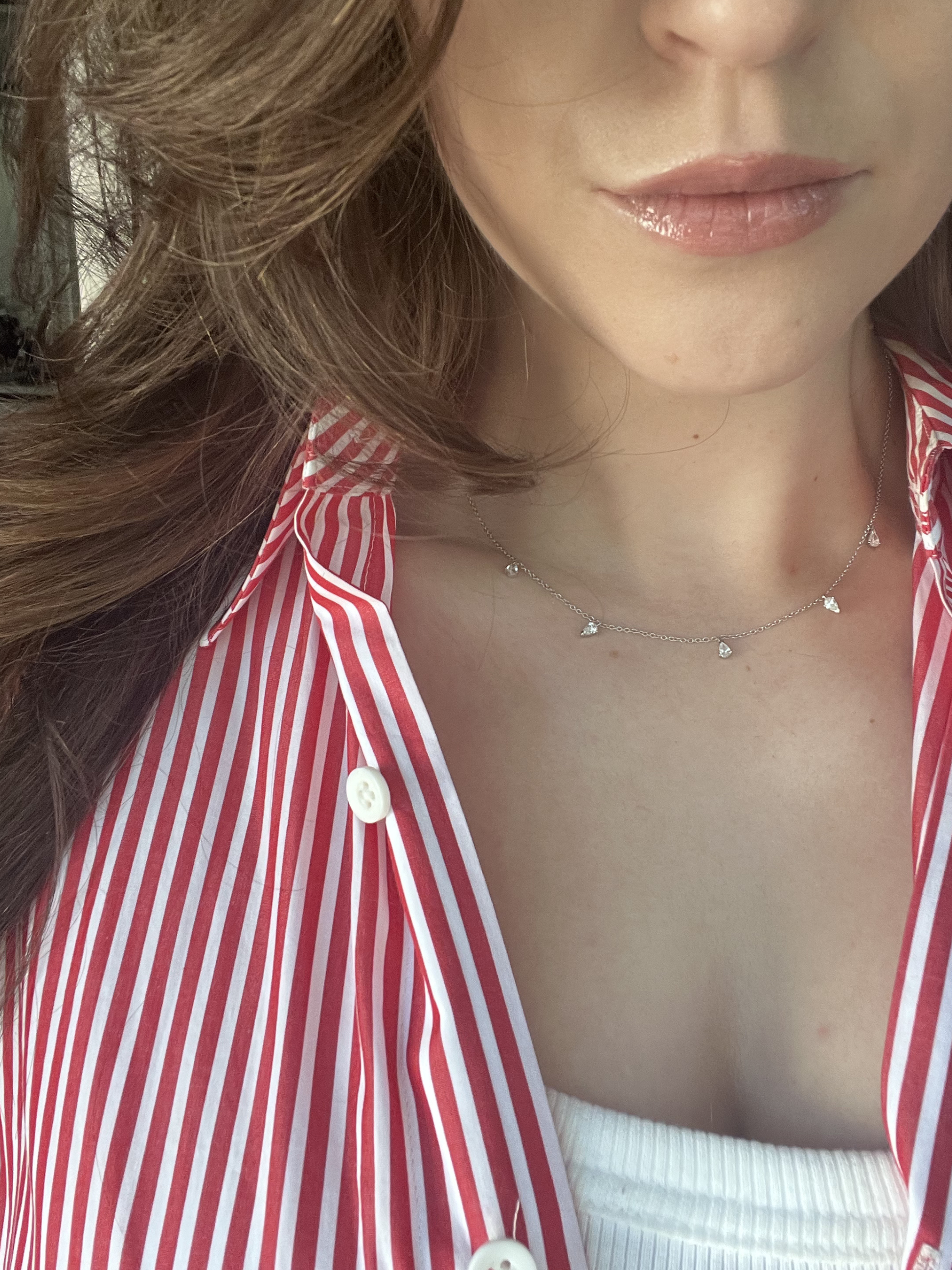 FREYA pear diamond necklace worn on neckline in 14ct white gold by DÉSIR, the alternating pear design signature in fine jewellery