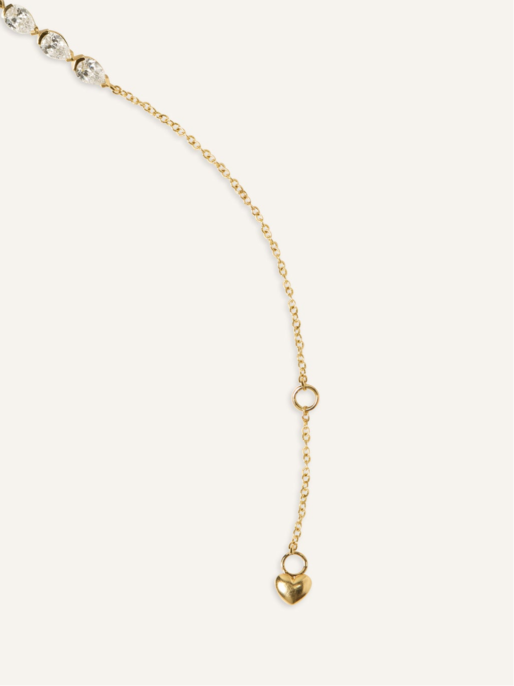 GIA pear diamond bracelet worn on wrist in solid 14ct yellow gold, made for the diamond bracelet stack