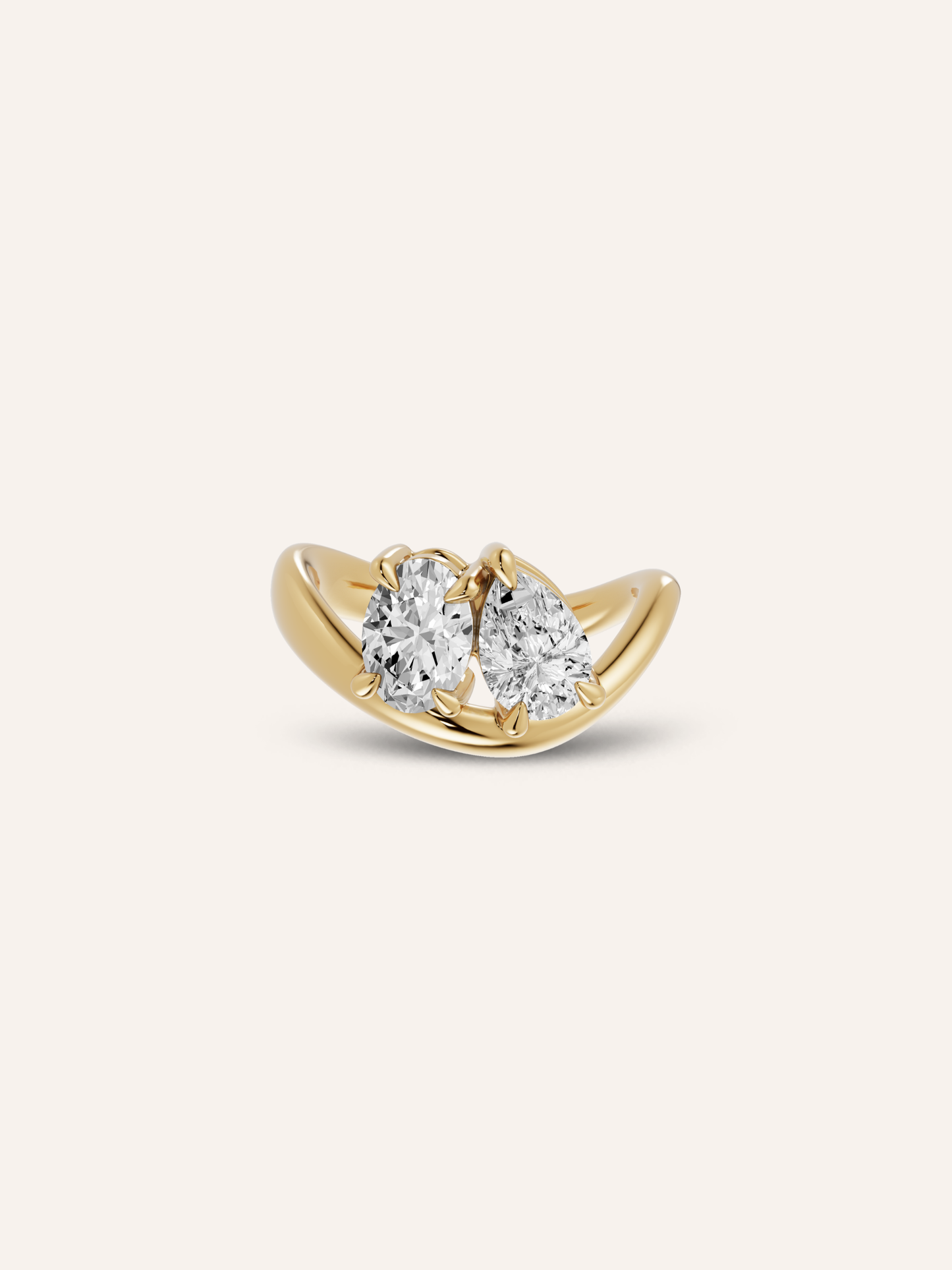 GIGI ring, a toi et moi engagement ring with an oval and pear diamond in solid 18ct yellow gold by DÉSIR, an Australian designer of engagement rings