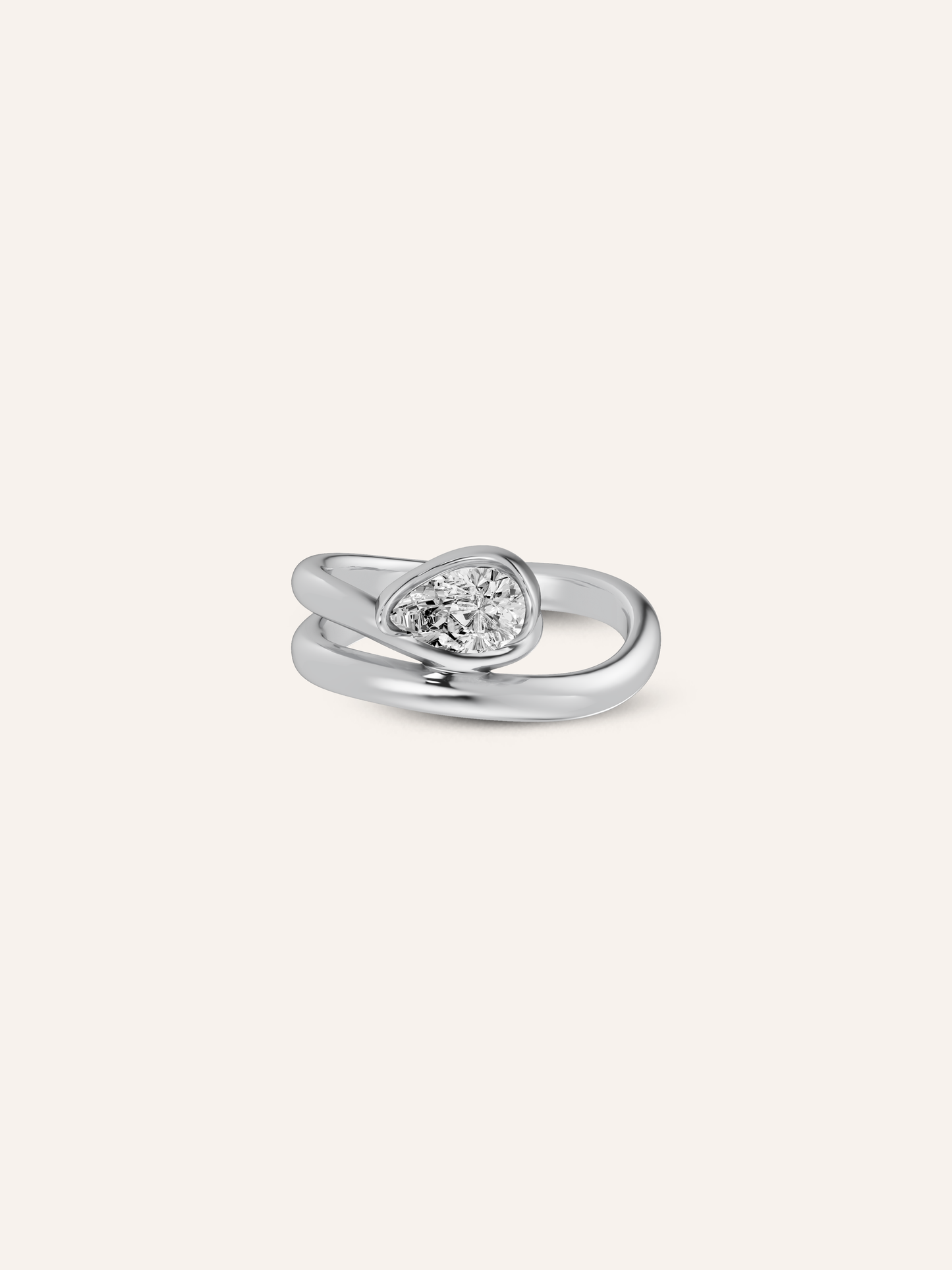 The GLO ring, a pear-cut white diamond pinky ring in solid white gold by DÉSIR, an Australian fine jewellery studio