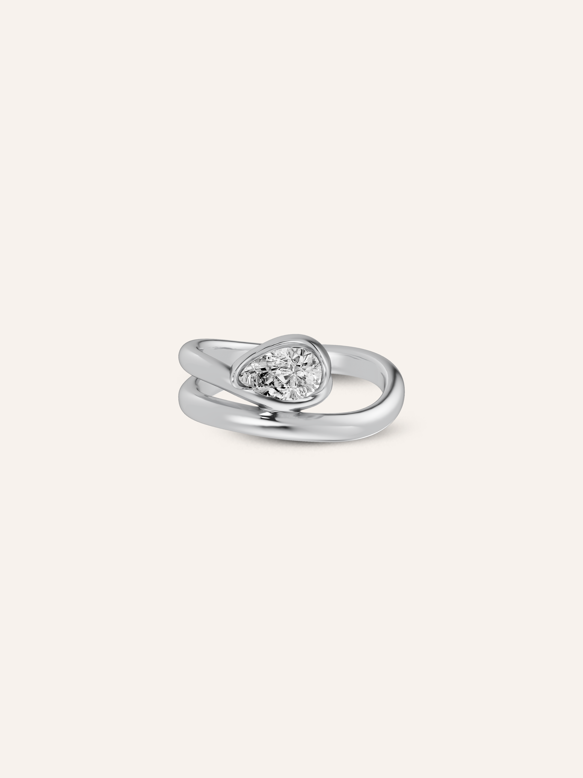 The GLO ring, a pear-cut white diamond pinky ring in solid white gold by DÉSIR, an Australian fine jewellery studio