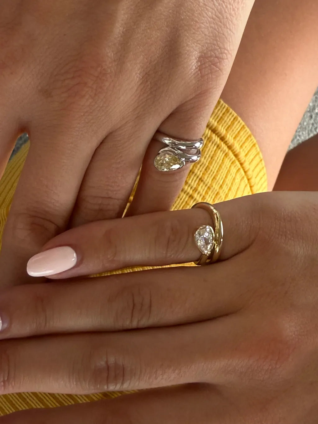 GLO white diamond pinky rings worn as a matching pair in solid white gold, available with natural diamonds by DÉSIR