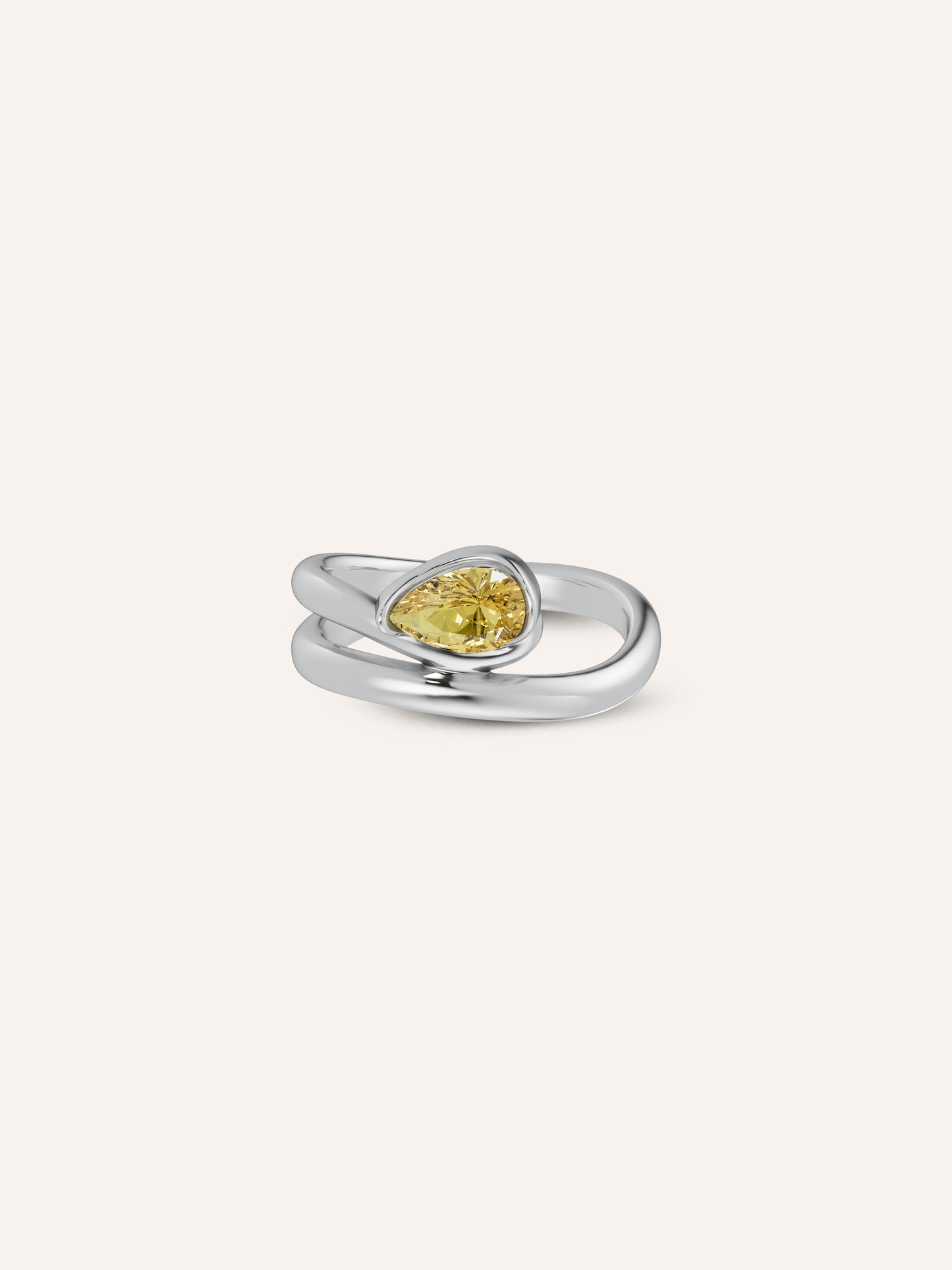 The GLO ring, a pear-cut yellow diamond pinky ring in solid white gold by DÉSIR, an Australian fine jewellery studio