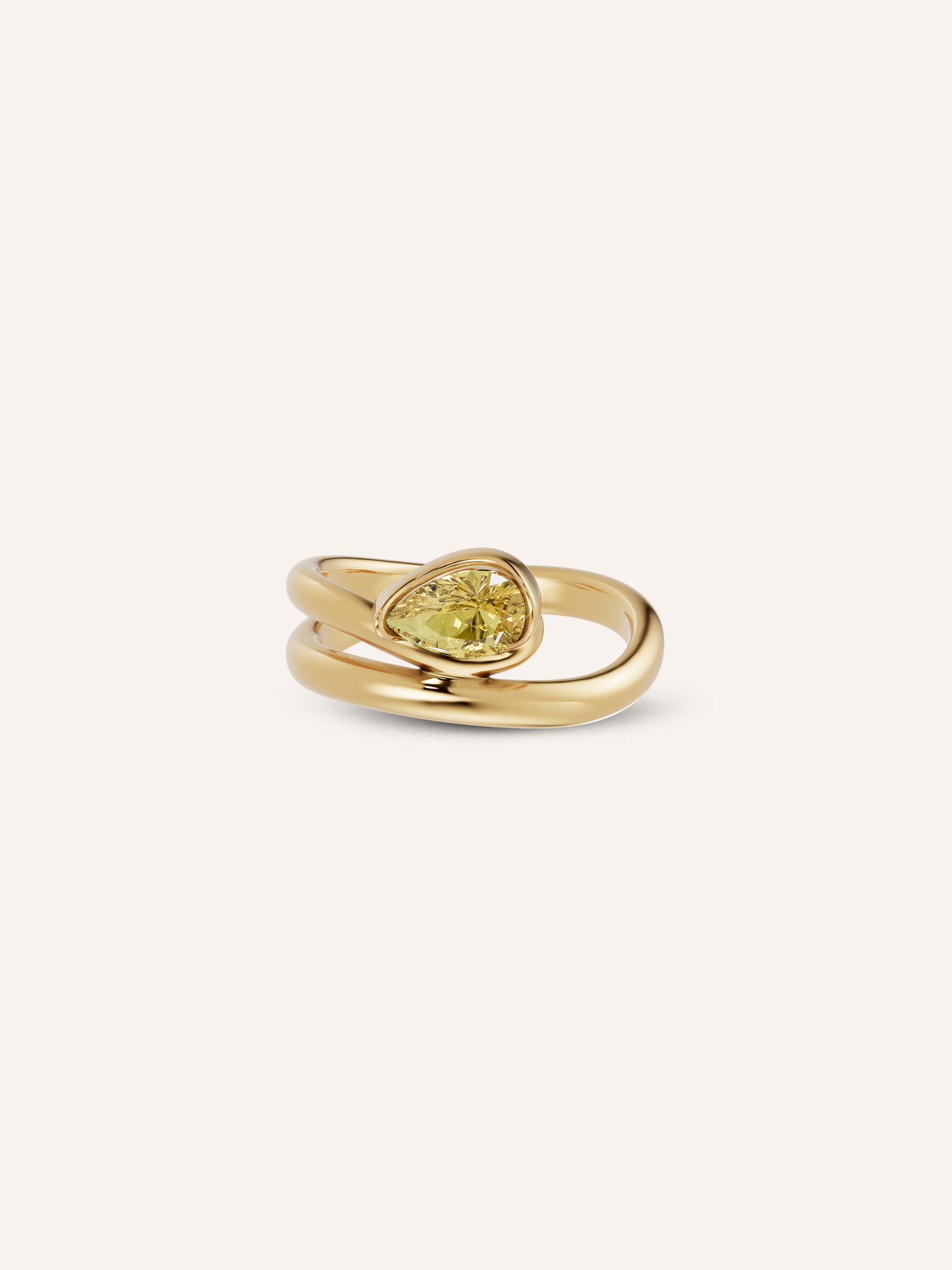 The GLO ring, a pear-cut yellow diamond pinky ring in solid yellow gold by DÉSIR, an Australian fine jewellery studio