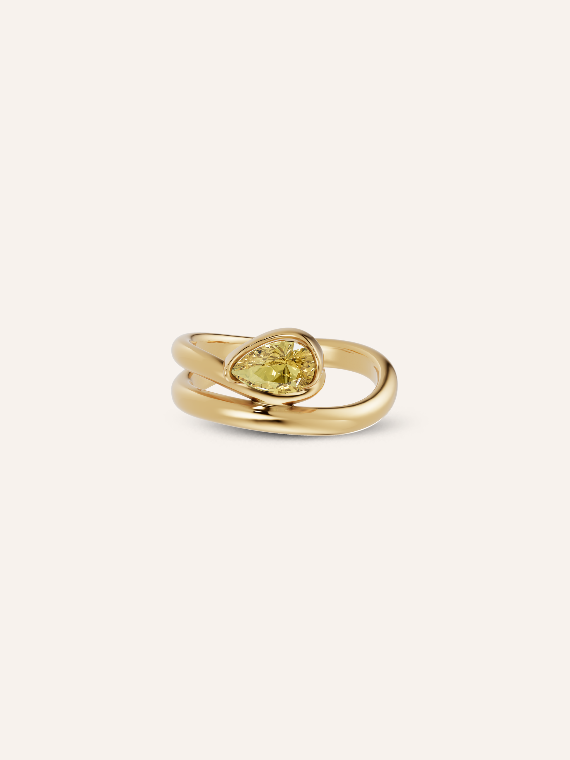 The GLO ring, a pear-cut yellow diamond pinky ring in solid yellow gold by DÉSIR, an Australian fine jewellery studio