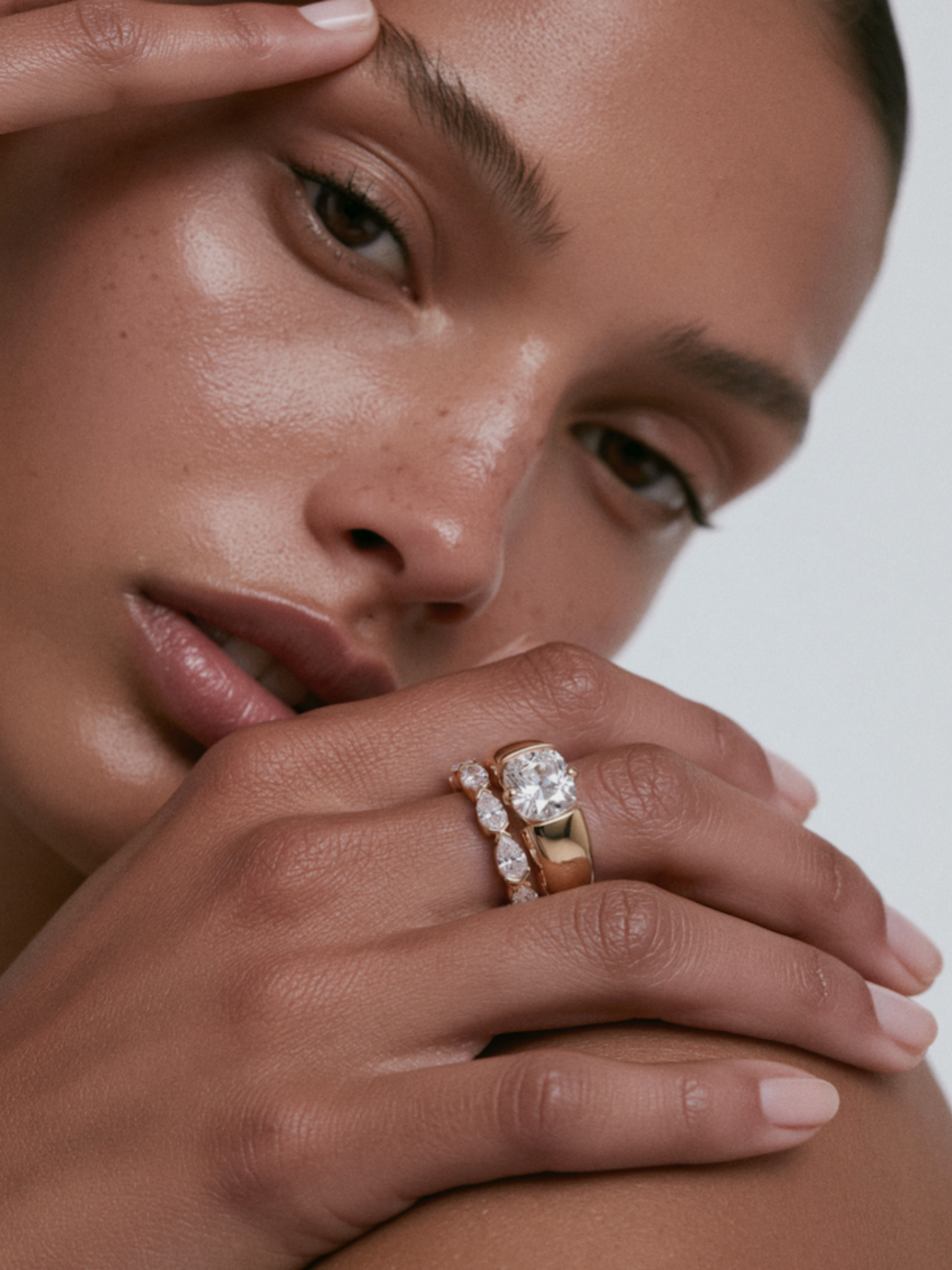 KAIA elongated cushion-cut diamond ring worn on hand in solid 18k gold, a unique engagement ring by DÉSIR