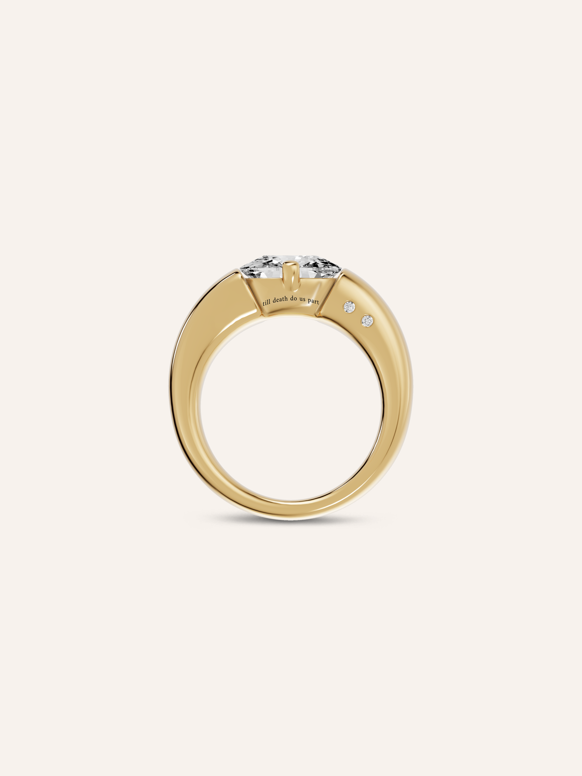 Side view of the KAIA ring showing the lab-grown elongated cushion diamond raised on two prongs above the sculptural signet-style band