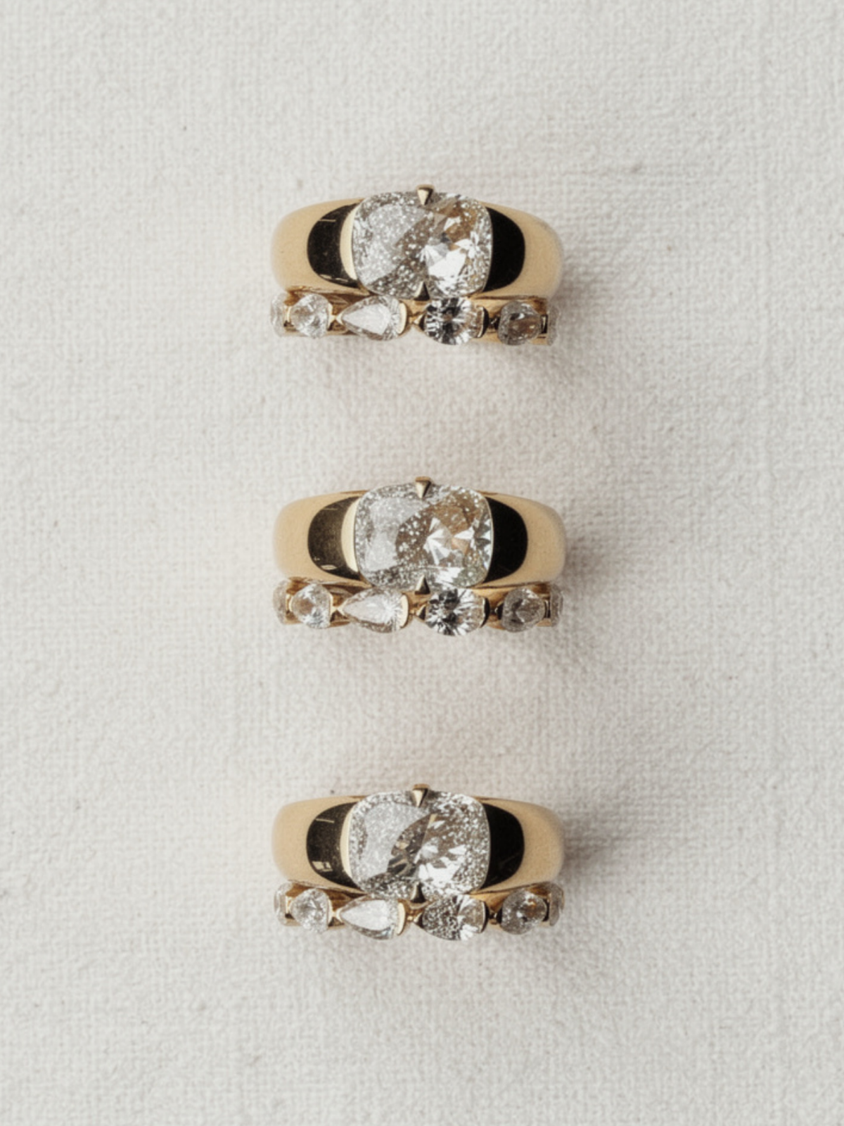 Close-up of the recessed engraving panel and hammer-set diamonds on the KAIA solid gold band, available as a custom engagement ring