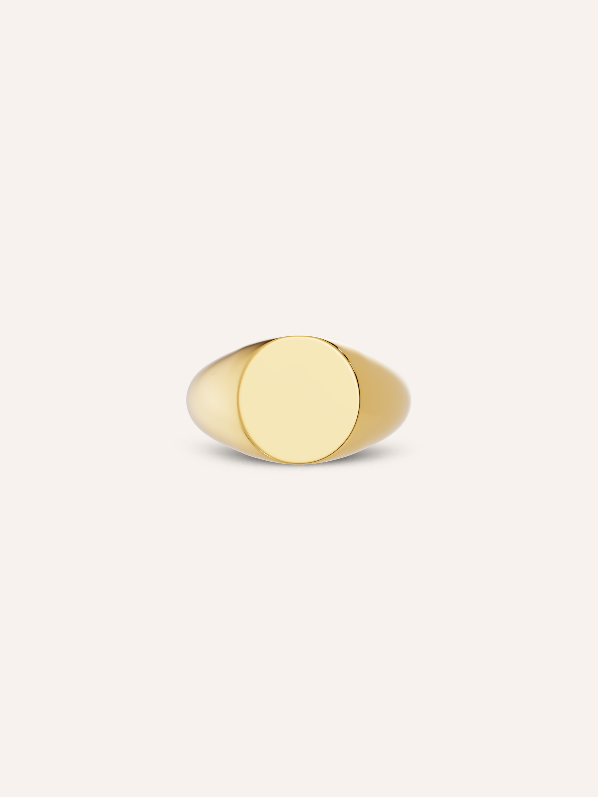 LEO men's signet ring with a plain round face in solid yellow gold, available with letter engraving and worn as a pinky ring, a custom signet by DÉSIR