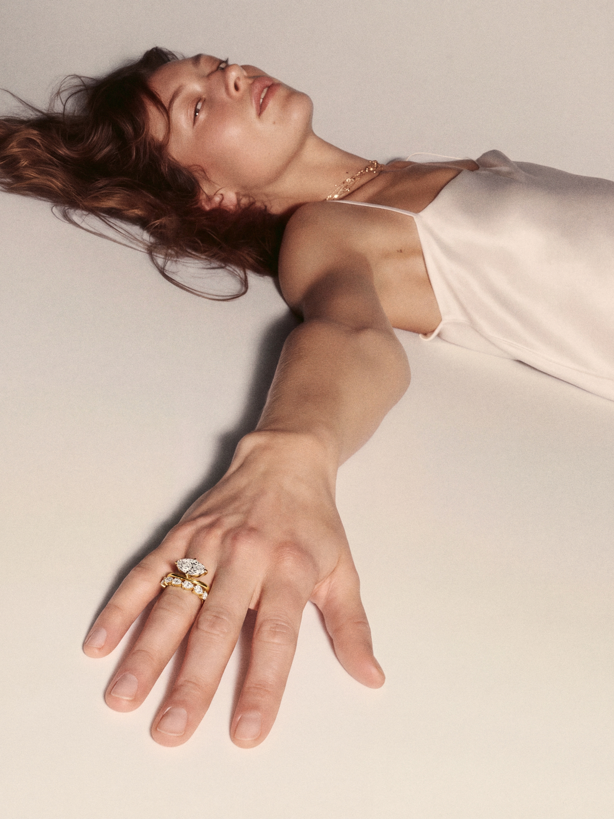 The NINA ring, an east-west pear diamond wedding band in solid 18ct gold by DÉSIR, an Australian fine jewellery studio