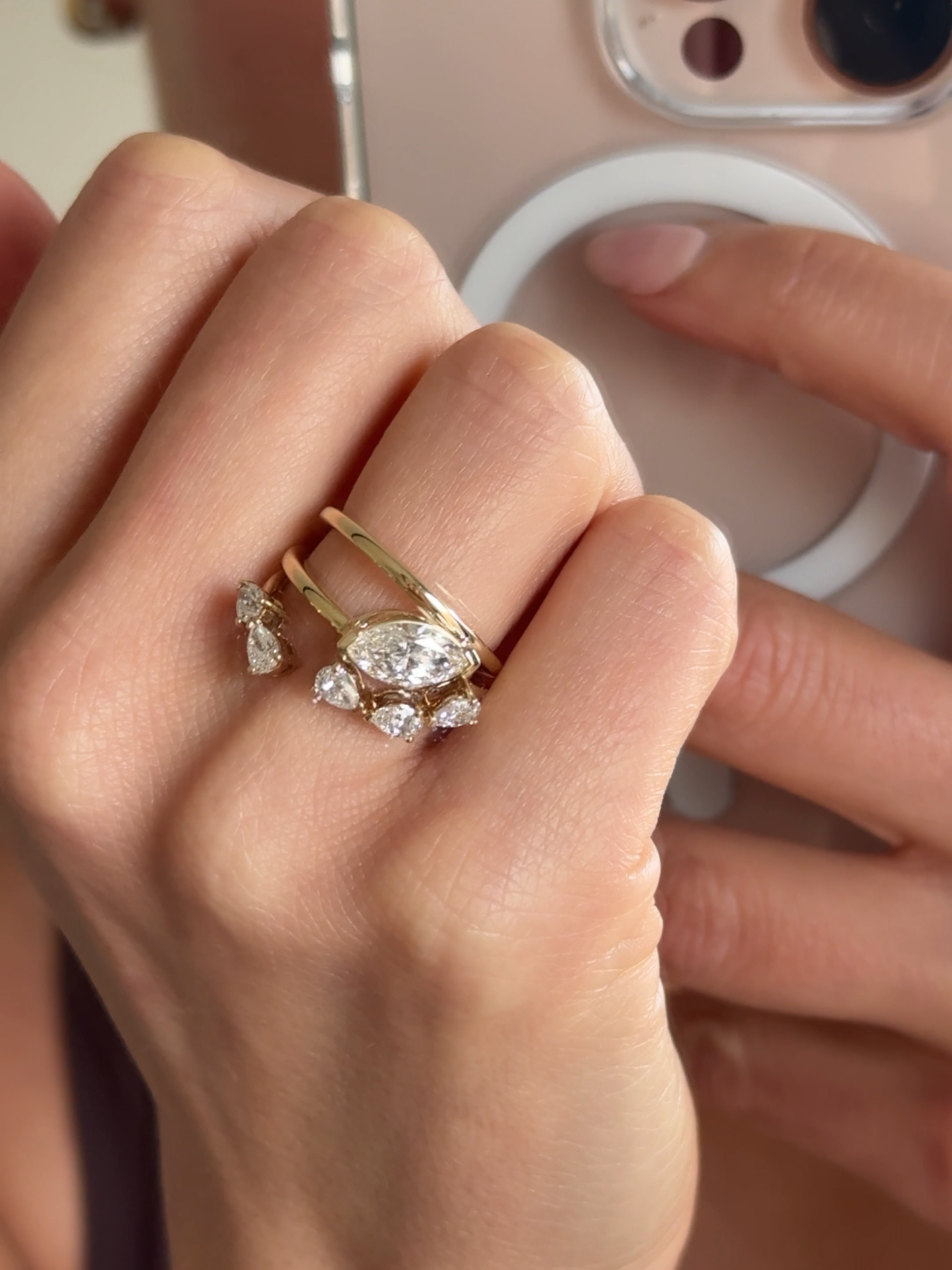 Close-up of five pear-cut lab-grown diamonds set east-west on the RUBI wrap, available with natural diamonds upon request