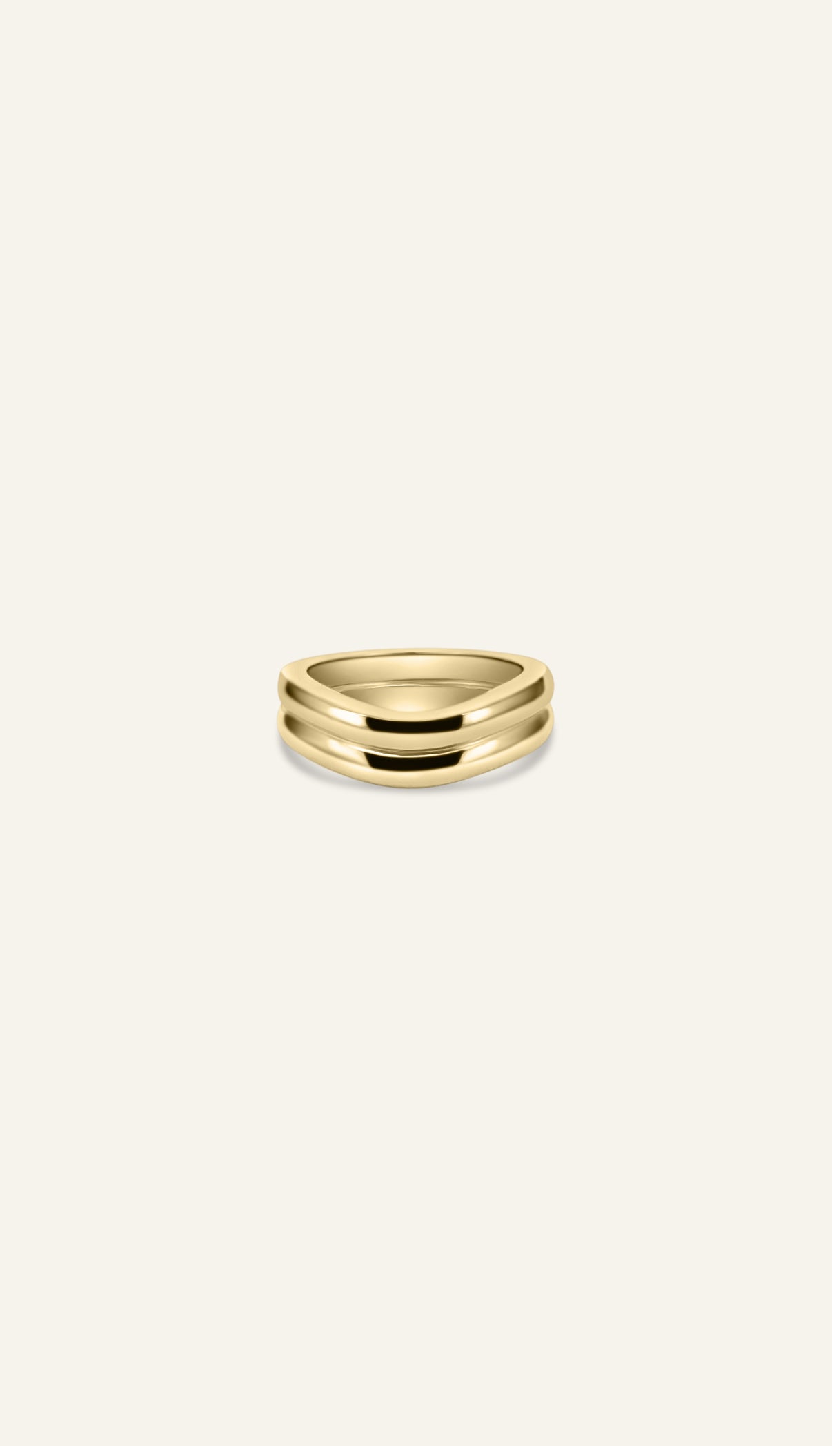 Side view of the SCULPT ring showing two seamless curves forming a rounded sculptural gold band
