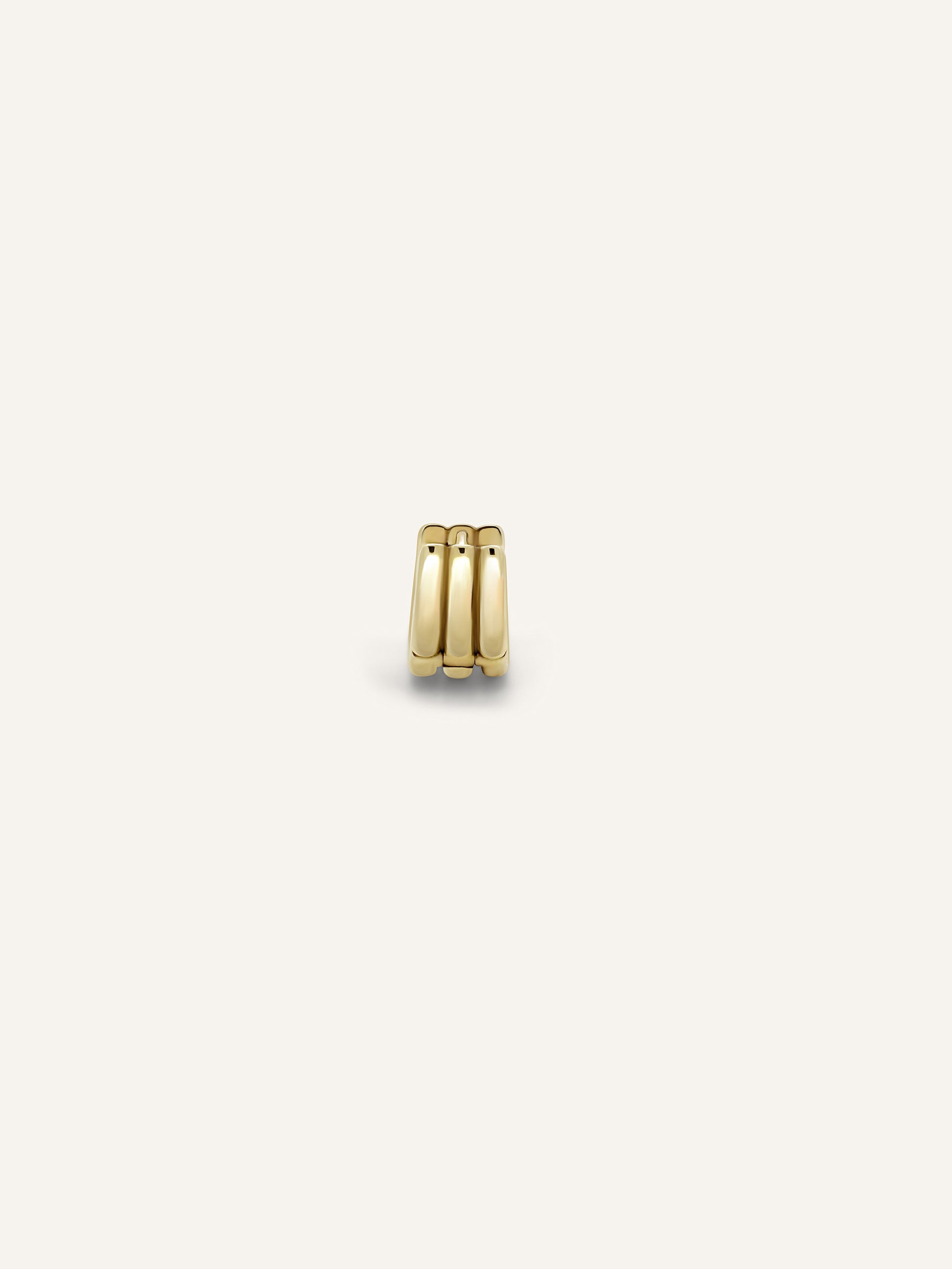 Close-up of the three-band SENA gold huggie in 9ct yellow gold, available as a custom piece