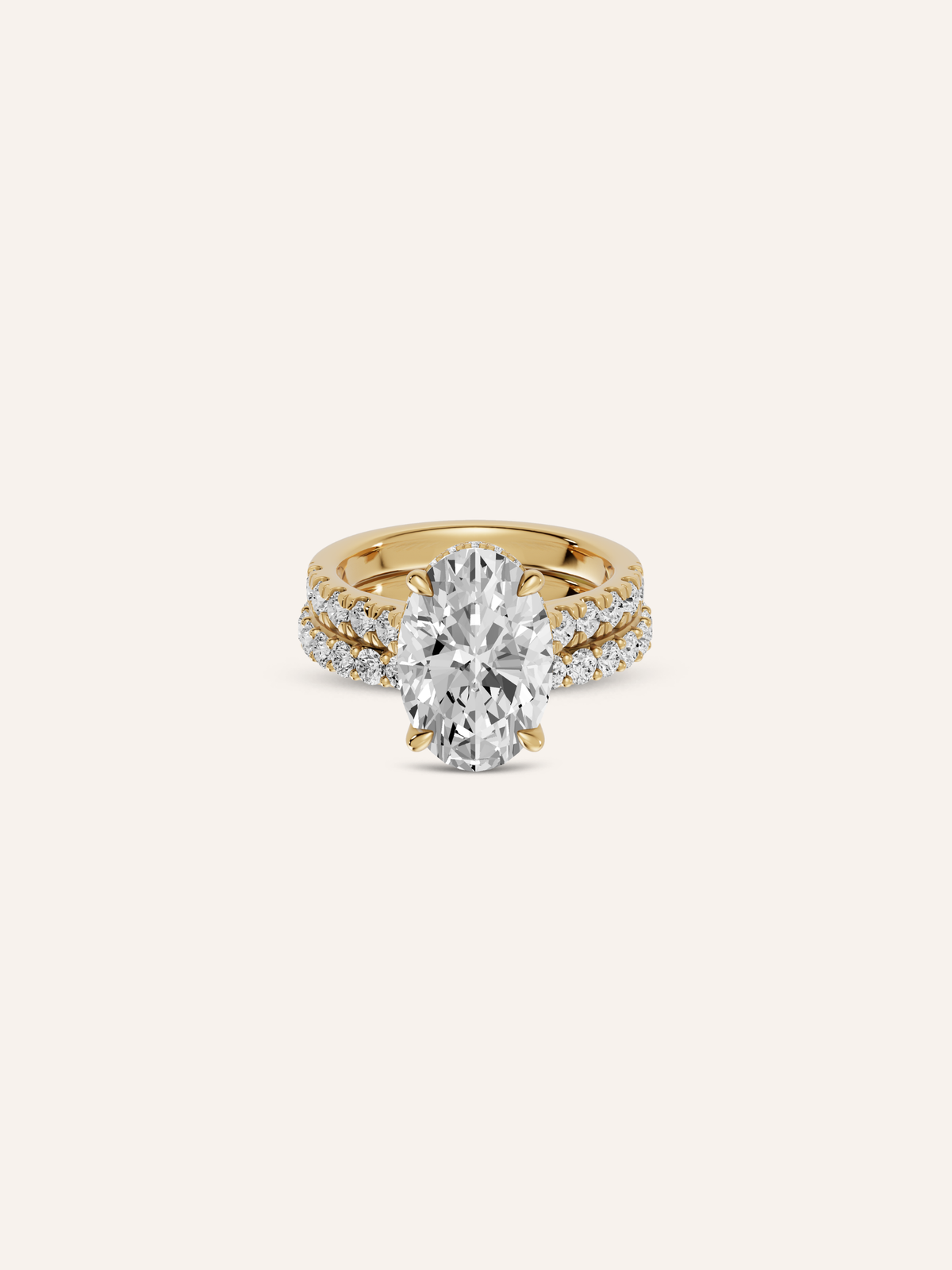 Close-up of the oval lab-grown diamond and pavé band on the SIENA yellow gold ring