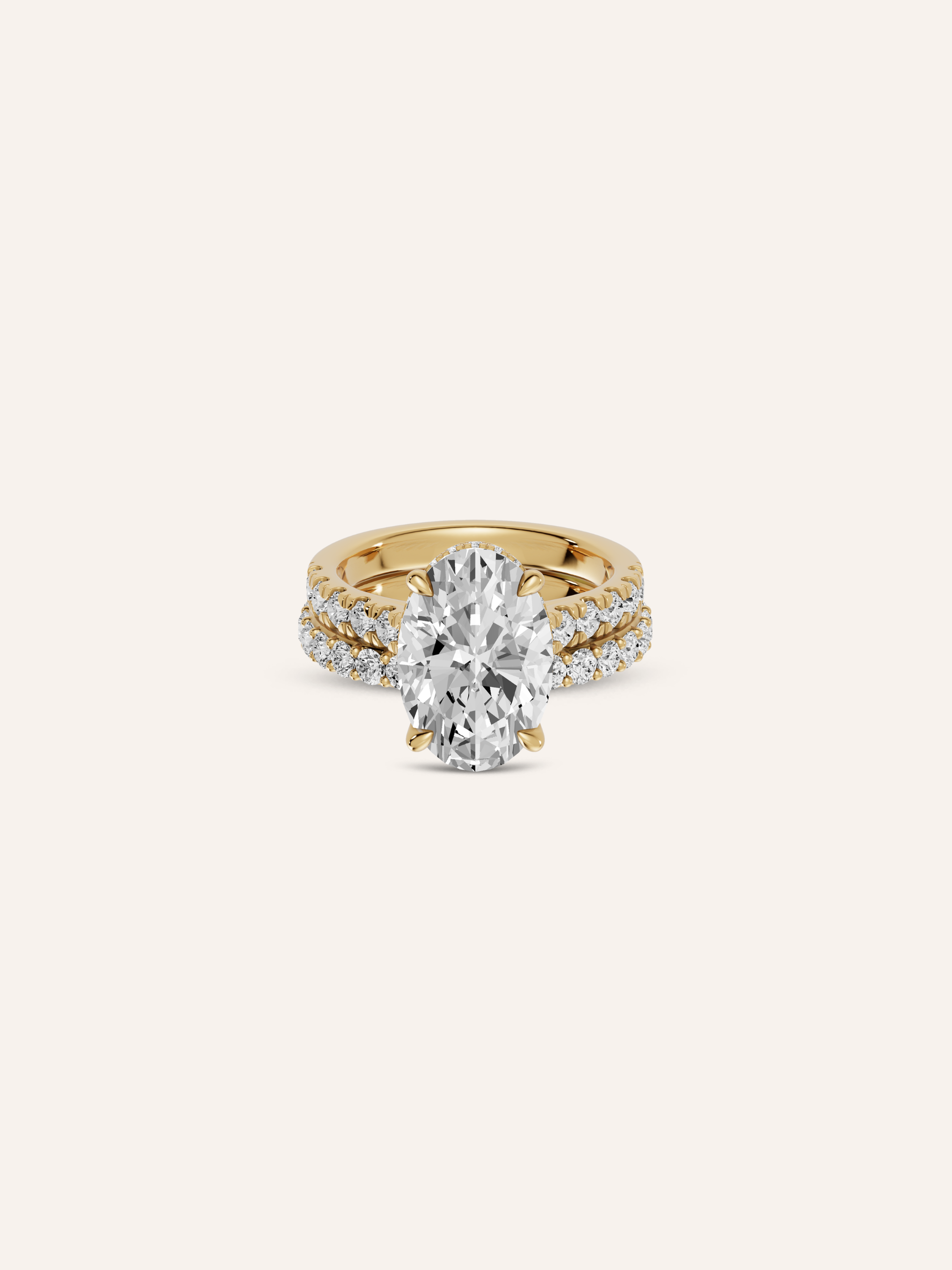 Close-up of the oval lab-grown diamond and pavé band on the SIENA yellow gold ring
