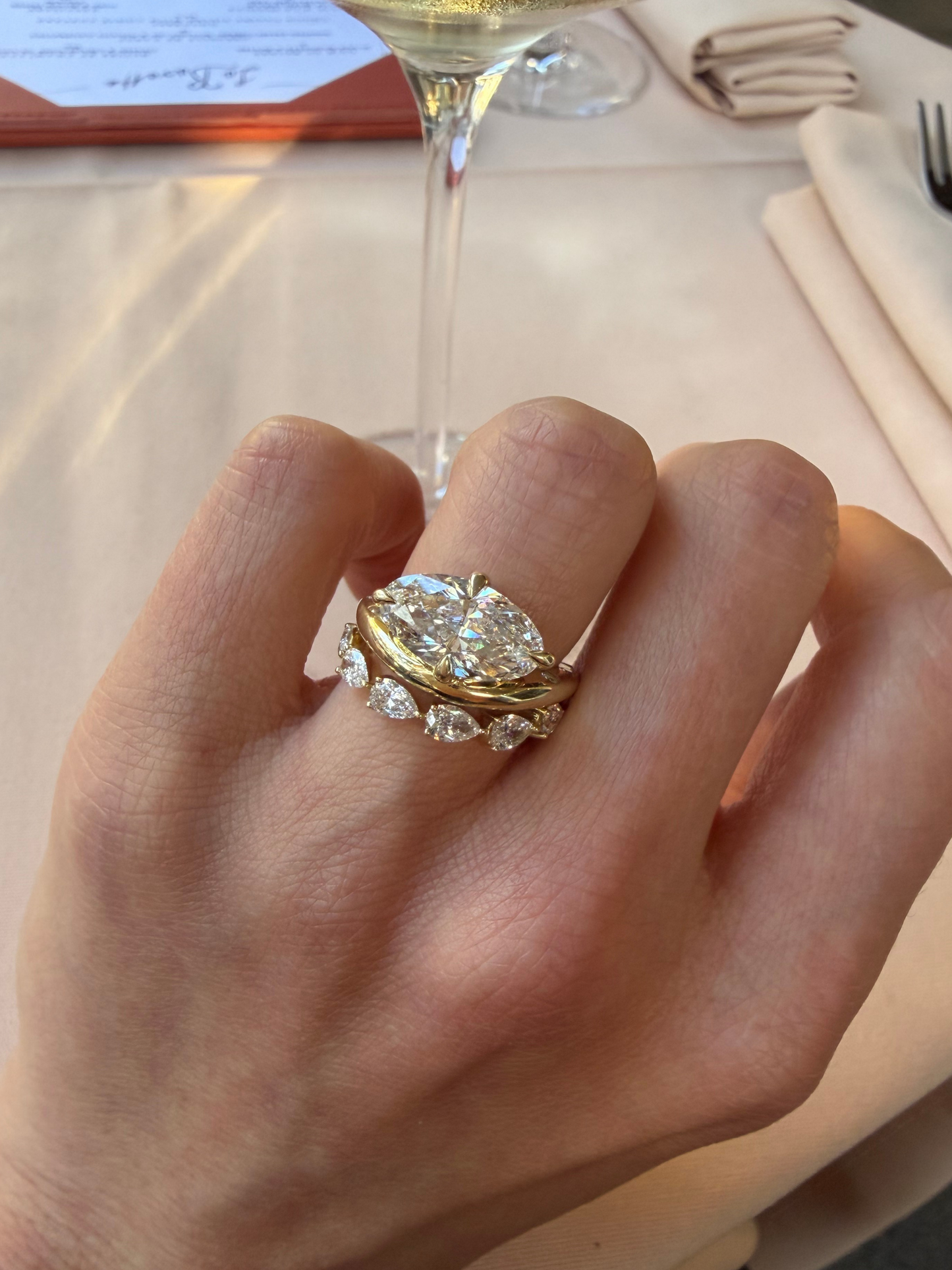 TIA east-west oval diamond engagement ring worn on hand in solid 18ct gold, made in Australia by DÉSIR