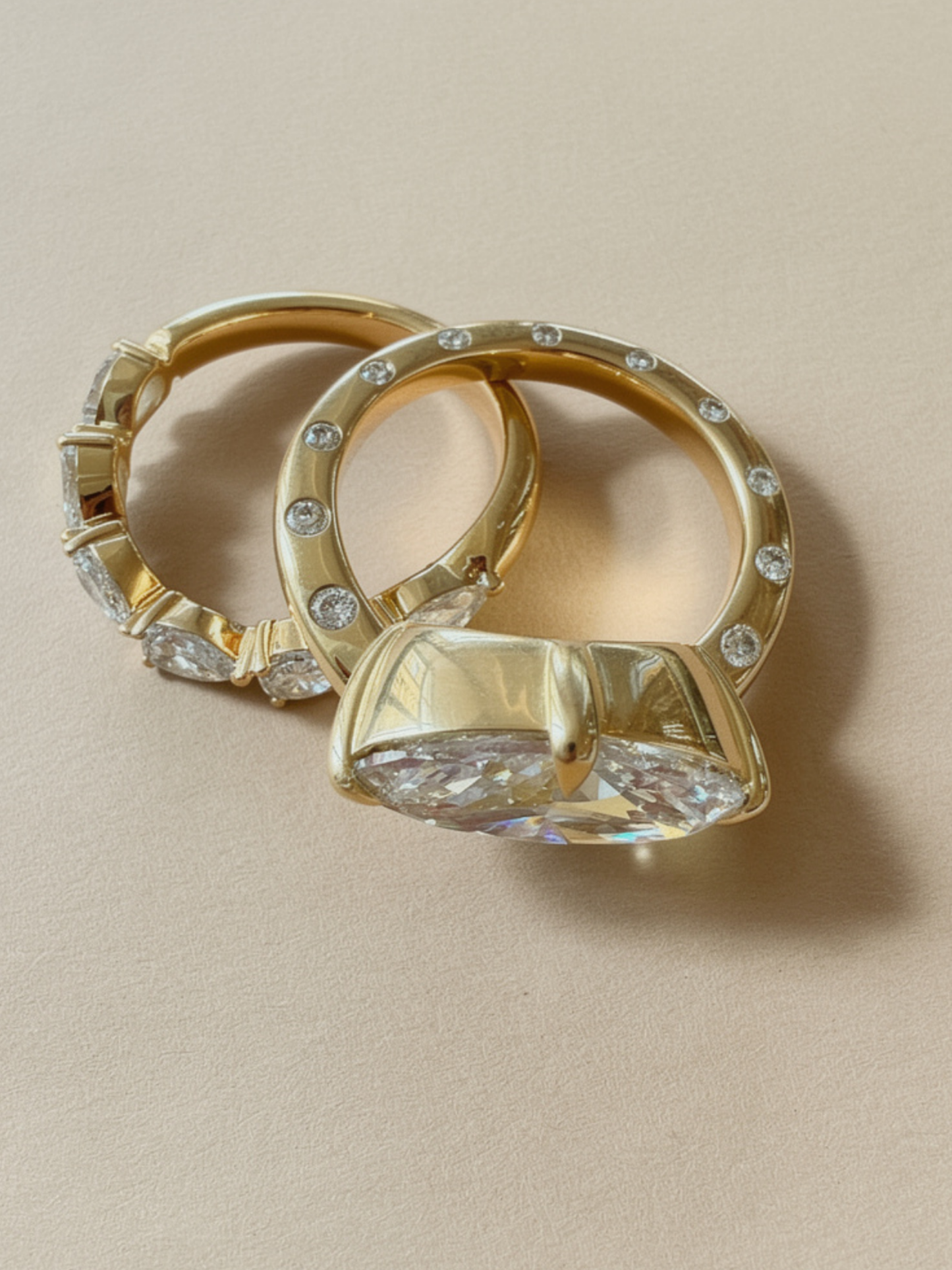 Side view of the TIA ring showing the lab-grown oval diamond held in a compass prong setting above the curved band