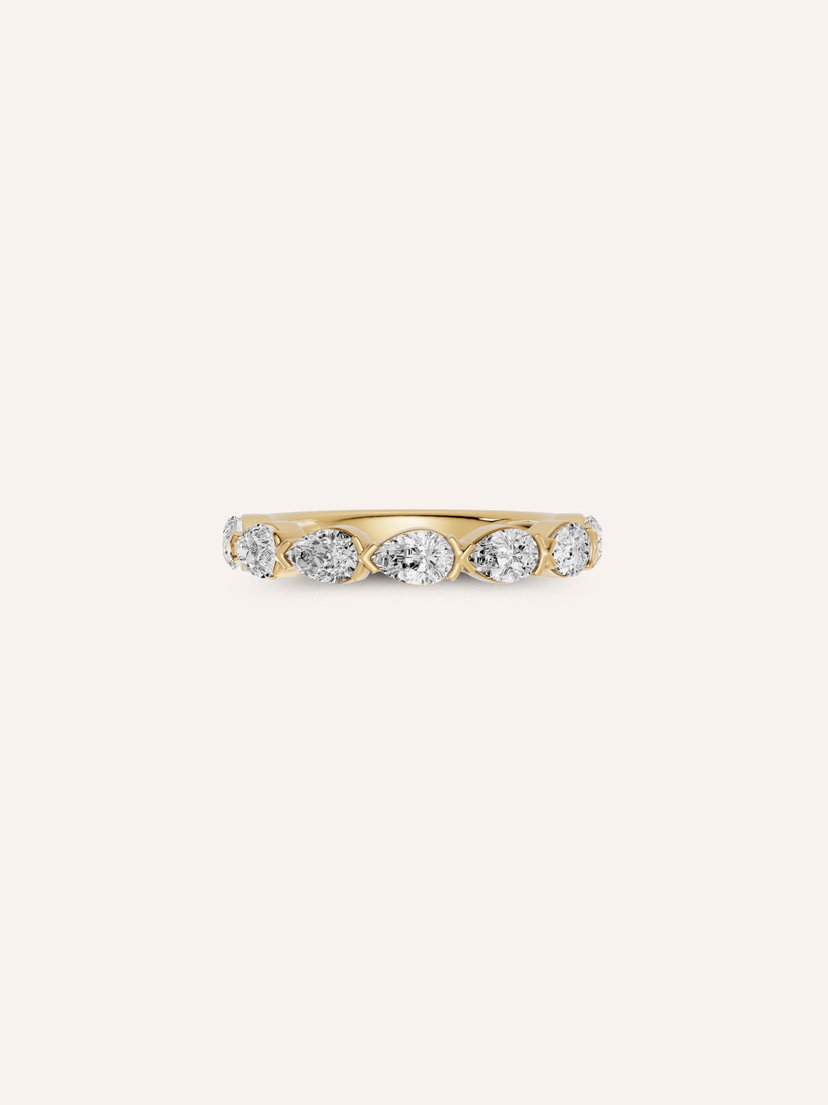 The TILLI ring, a curved pear-cut diamond wedding band in solid 18ct gold by DÉSIR, an Australian boutique jeweller