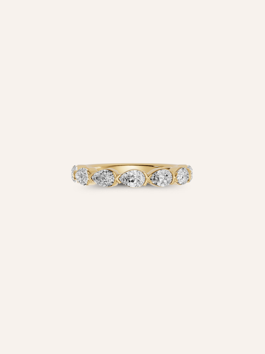 The TILLI ring, a curved pear-cut diamond wedding band in solid 18ct gold by DÉSIR, an Australian boutique jeweller