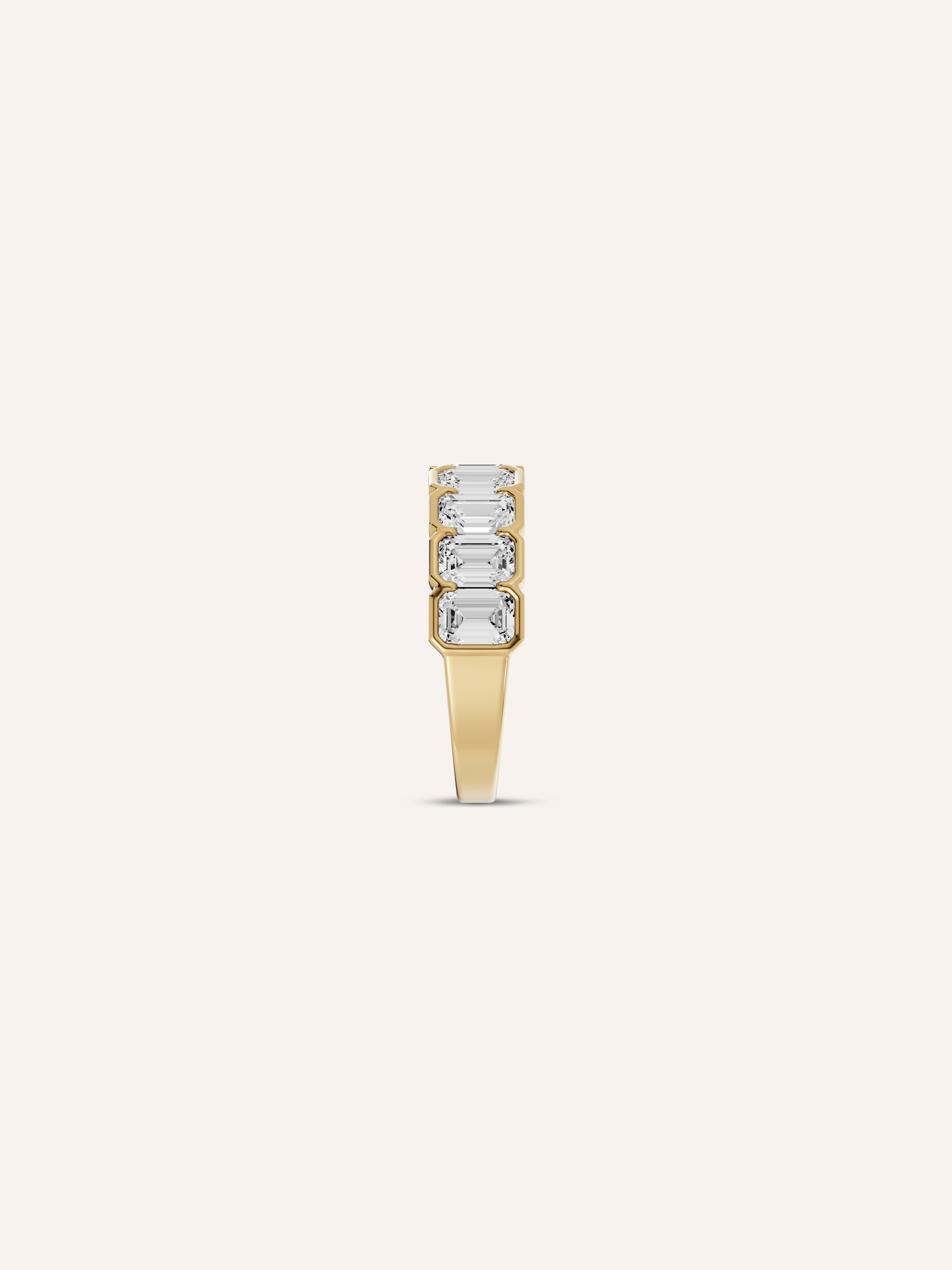 ZARA emerald-cut diamond eternity ring worn on hand as a diamond wedding band in solid yellow gold, made in Australia by DÉSIR