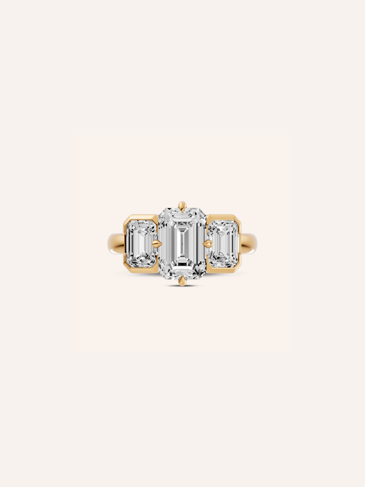 ENZO emerald-cut diamond trilogy engagement ring in yellow gold by DÉSIR, an Australian fine jewellery brand