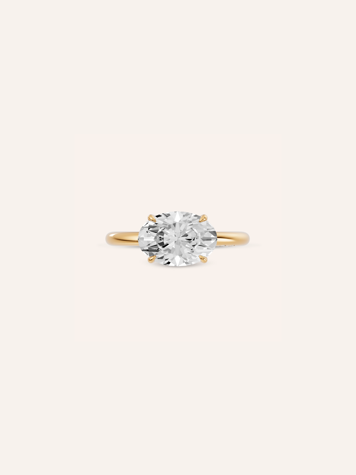 IRIS east-west oval diamond engagement ring in yellow gold