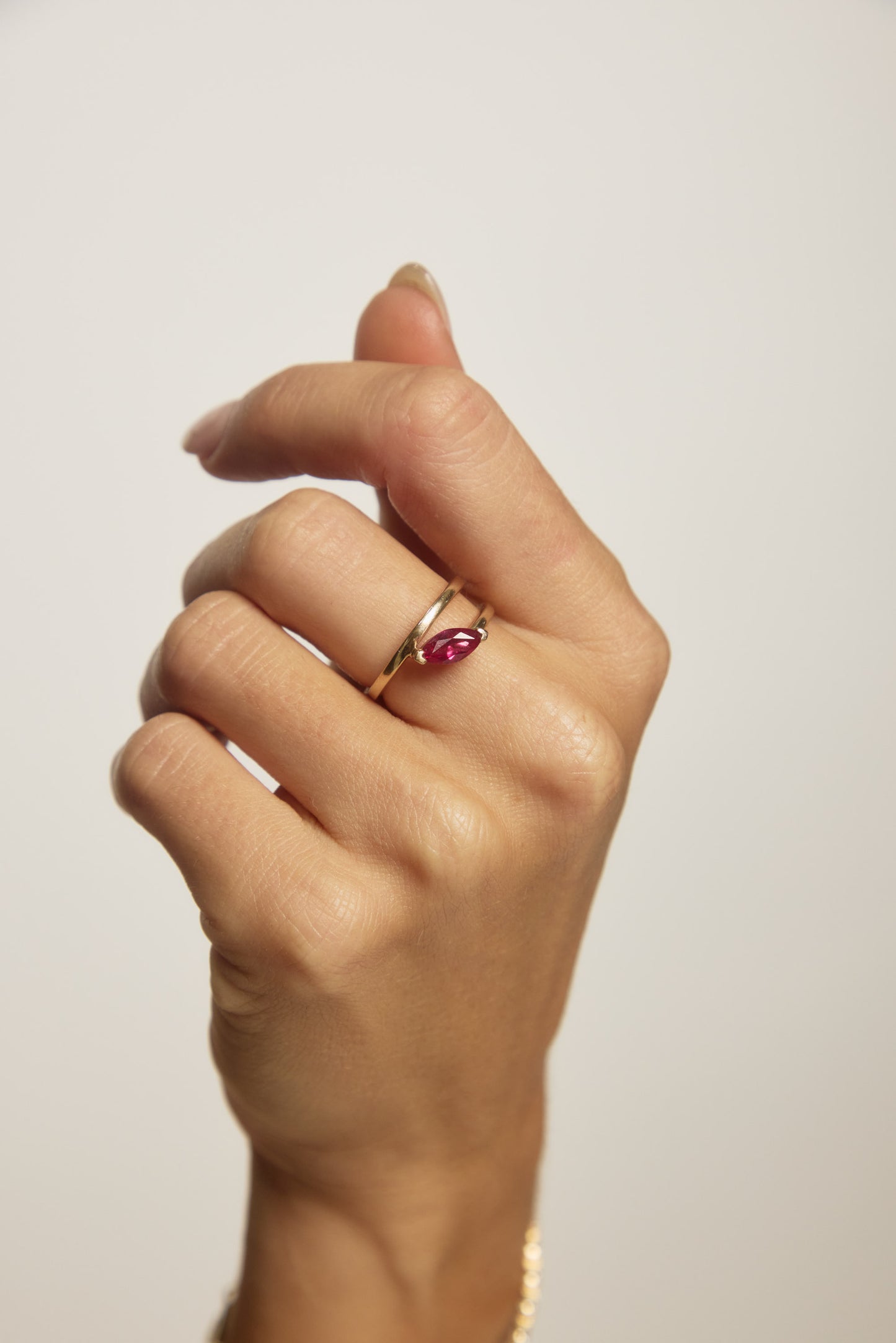 The RUBI marquise ruby ring in 9ct yellow gold, a luxury Australian fine jewellery piece with a sculpted double-band silhouette